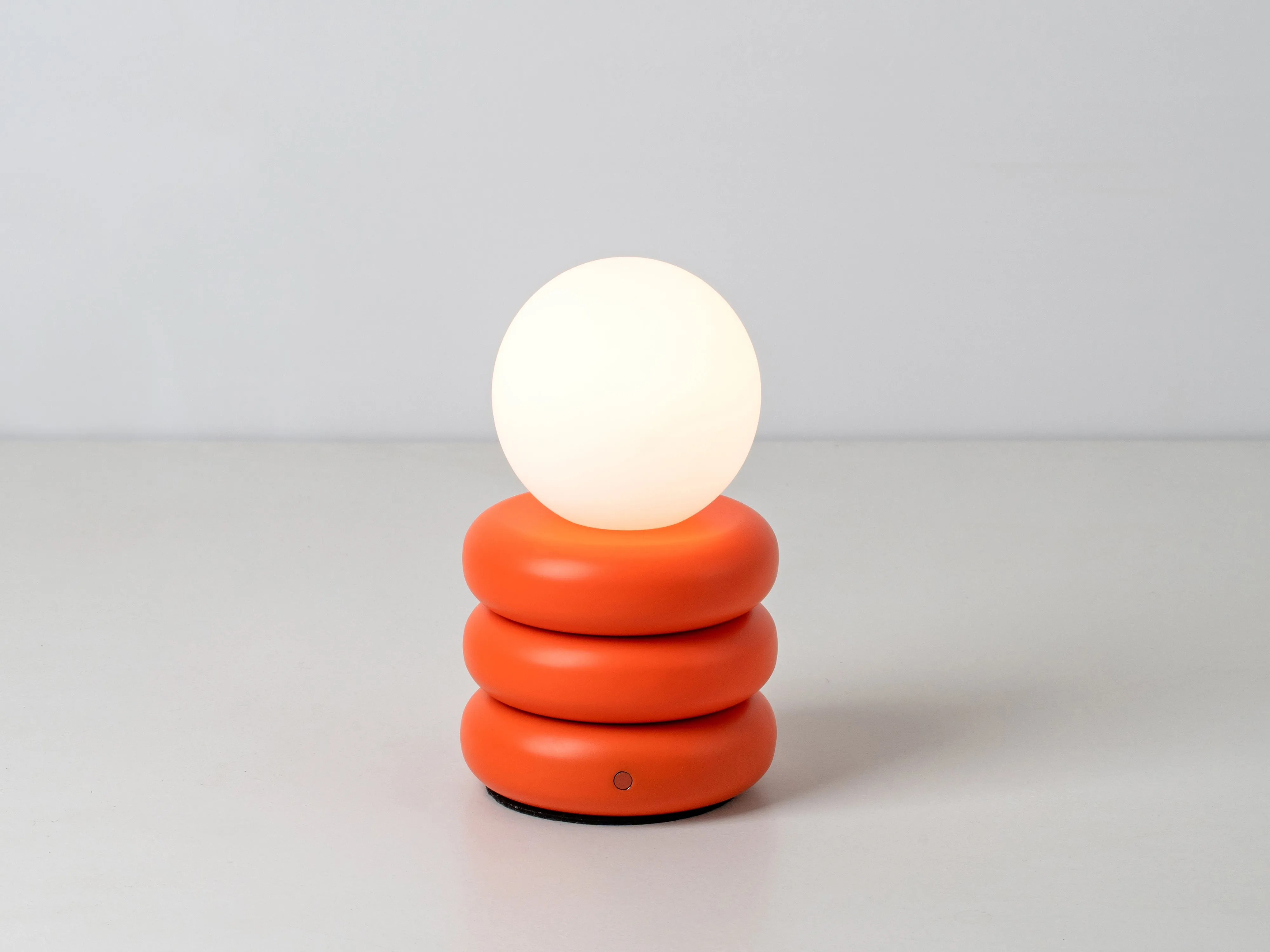 Peel orange tube cordless table lamp